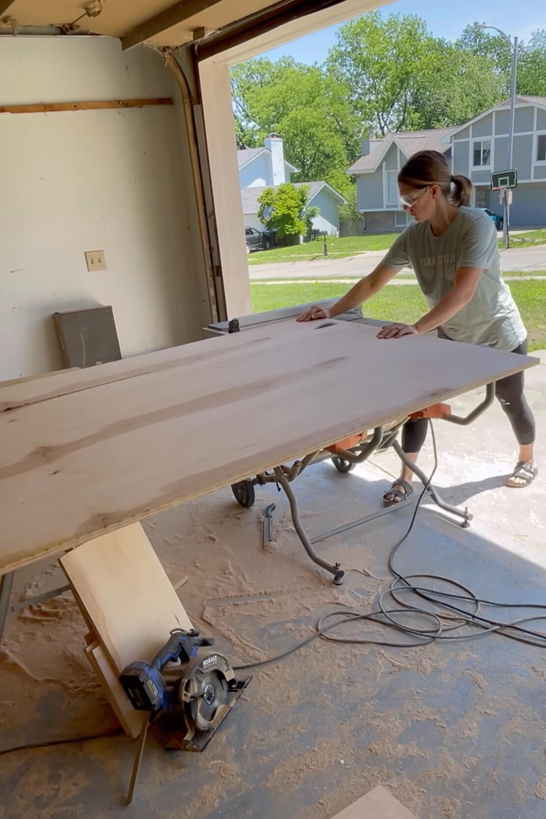 Using a table saw to build DIY pantry shelves.